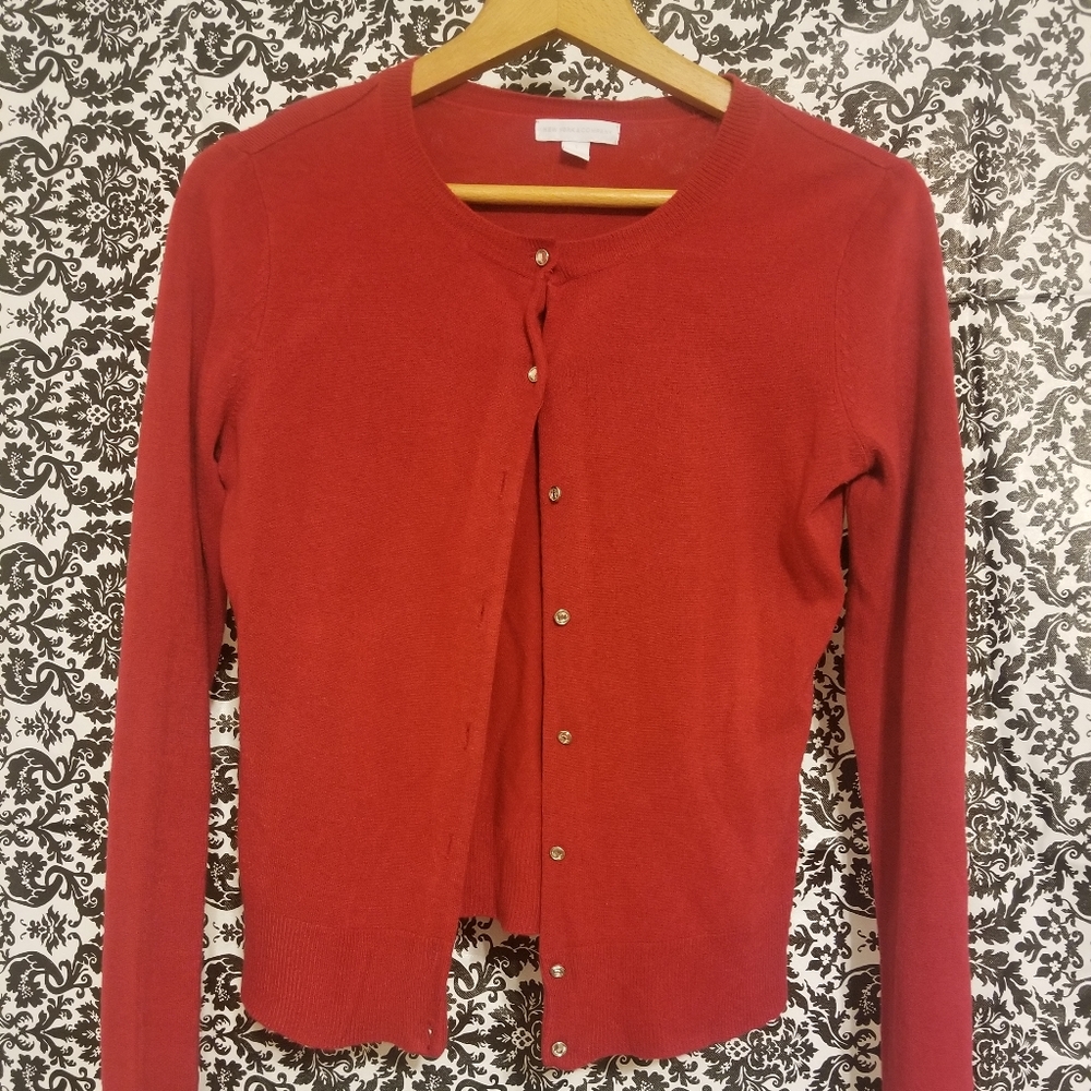 Red cardigan.
